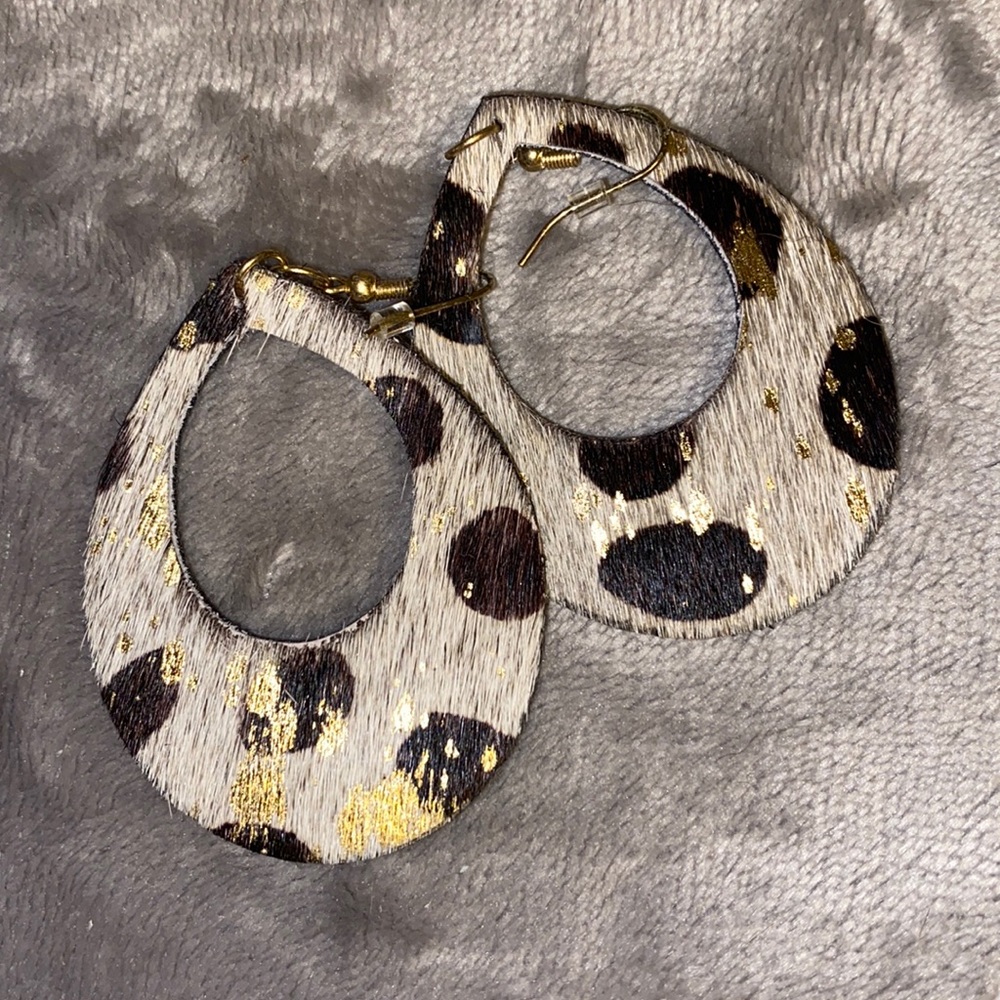 Animal print earrings. Never worn.